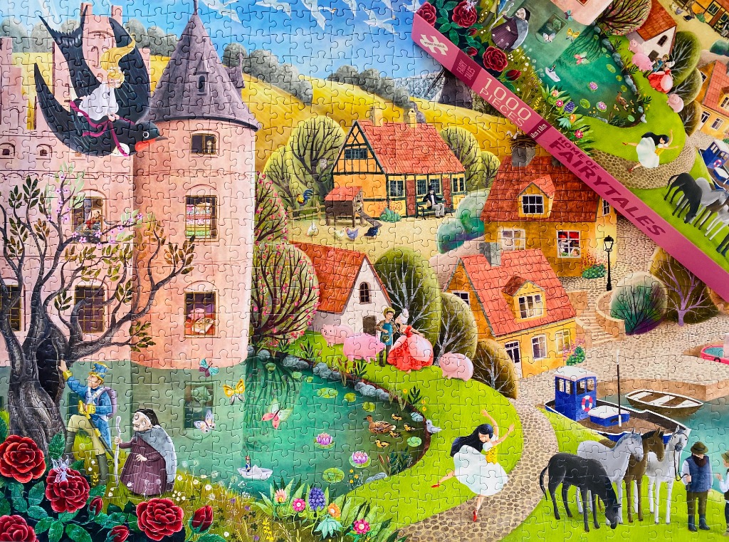 A whimsical fairytale illustration featuring a castle, a village, and various storybook characters in a vibrant landscape.