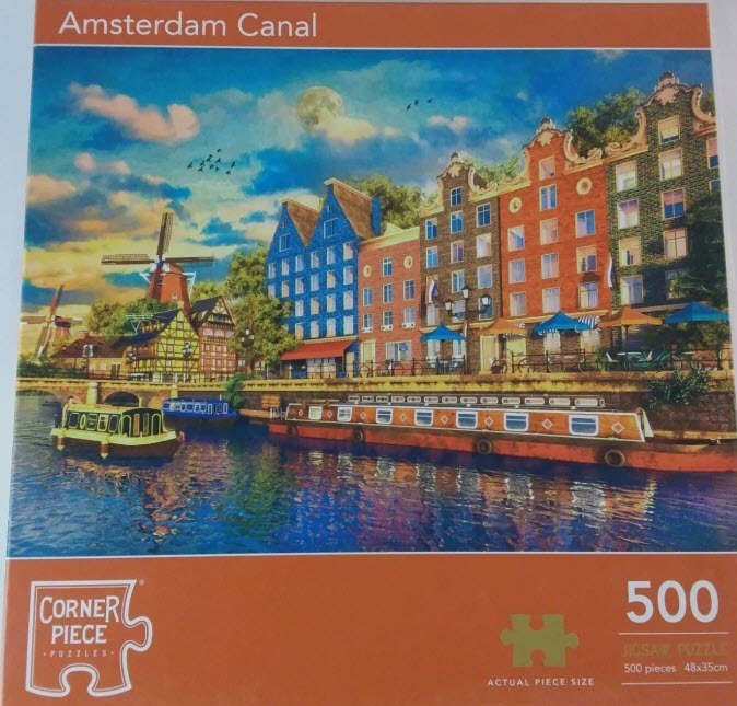 An illustration of an Amsterdam canal scene with colorful historic buildings, canal boats, and a windmill at sunset.