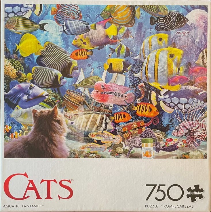 A fluffy cat sitting in the foreground looking at a busy underwater scene filled with various colorful tropical fish.
