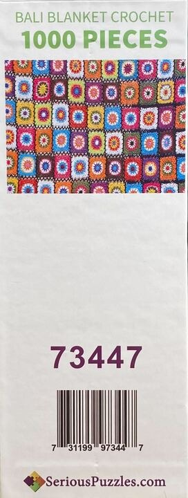 Colorful crochet blanket with squares in red, blue, orange, and yellow.