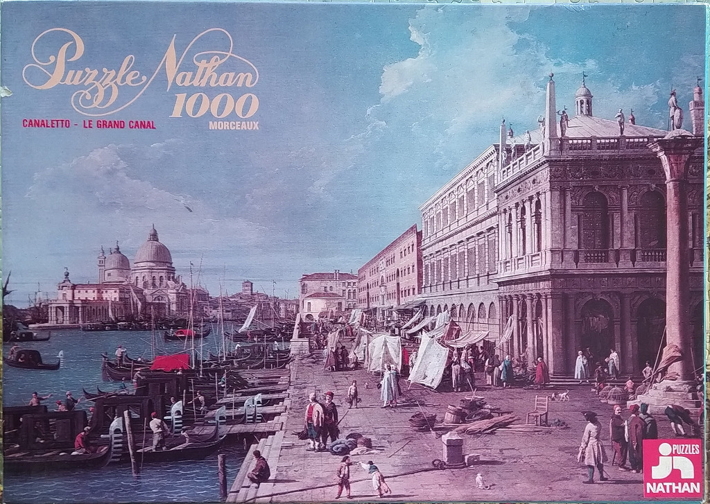 A classic oil painting by Canaletto showing a bustling, sunlit canal scene in 18th-century Venice.