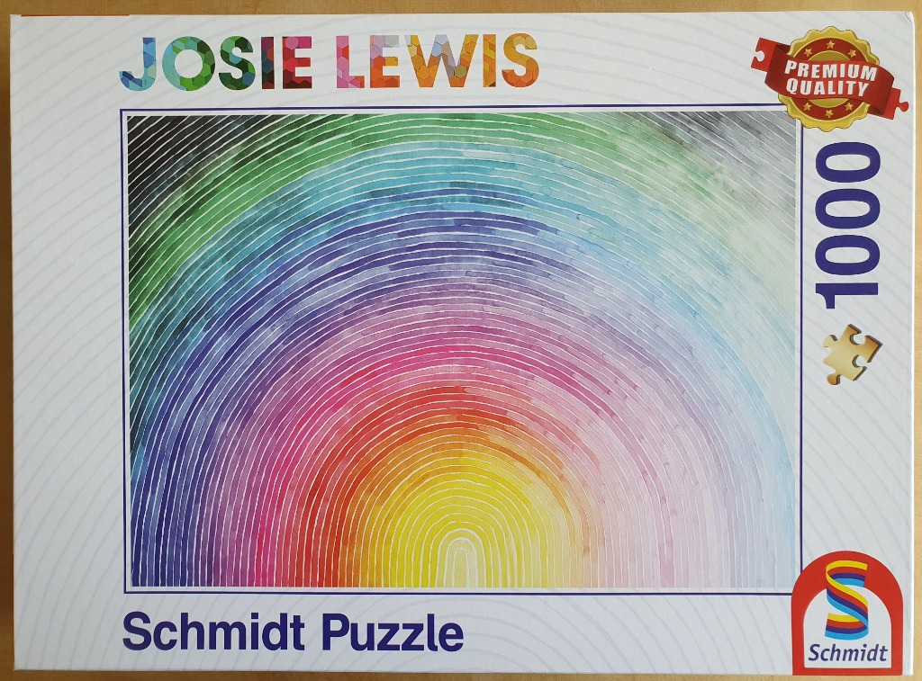 Abstract artwork featuring concentric rainbow-colored arches radiating from the bottom center.