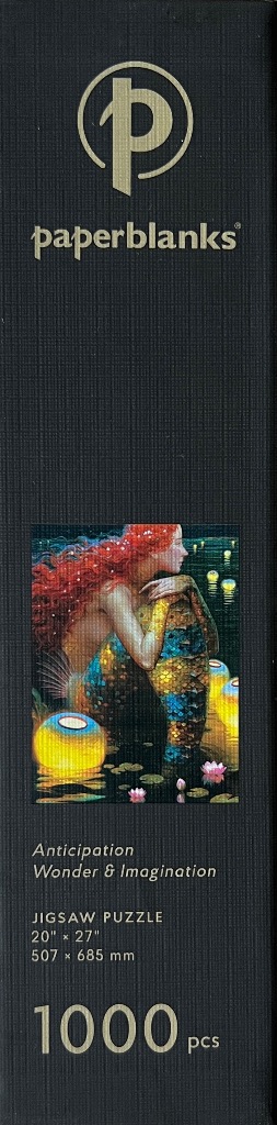 Painting of a red-haired mermaid sitting near glowing floating lanterns in a pond at night.