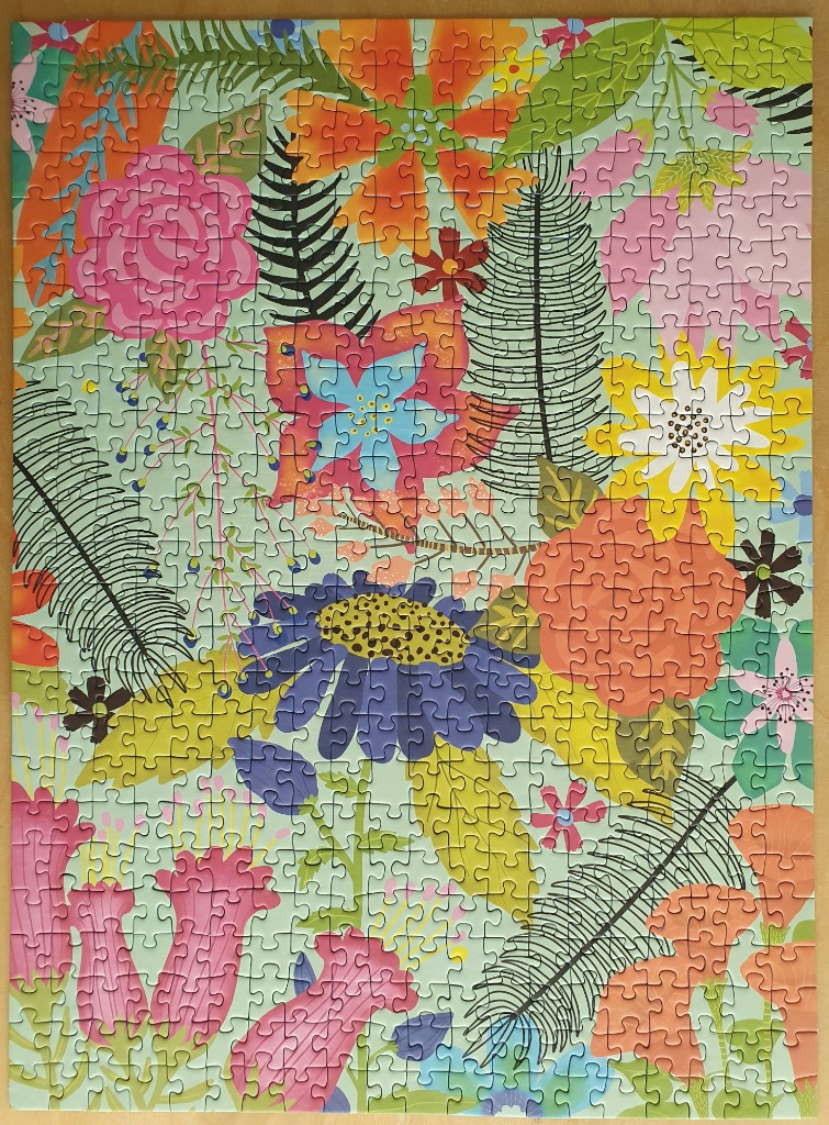A vibrant, flat-illustration style garden pattern featuring various colorful flowers and fern leaves on a mint background.