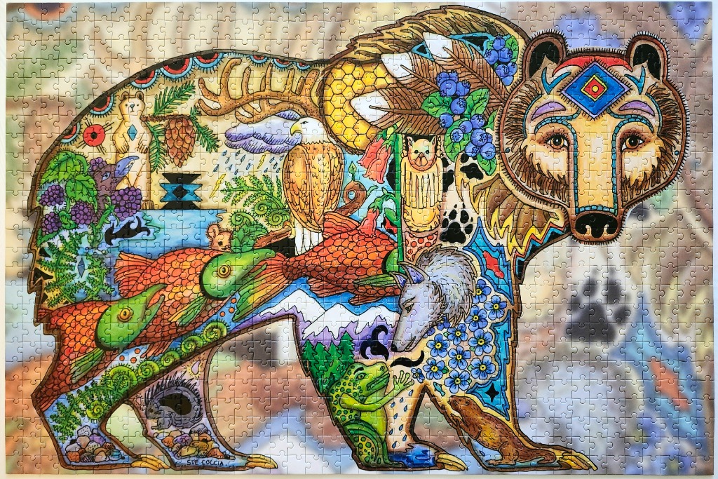 A whimsical illustration of a large bear filled with smaller animals and nature motifs in a folk-art style.