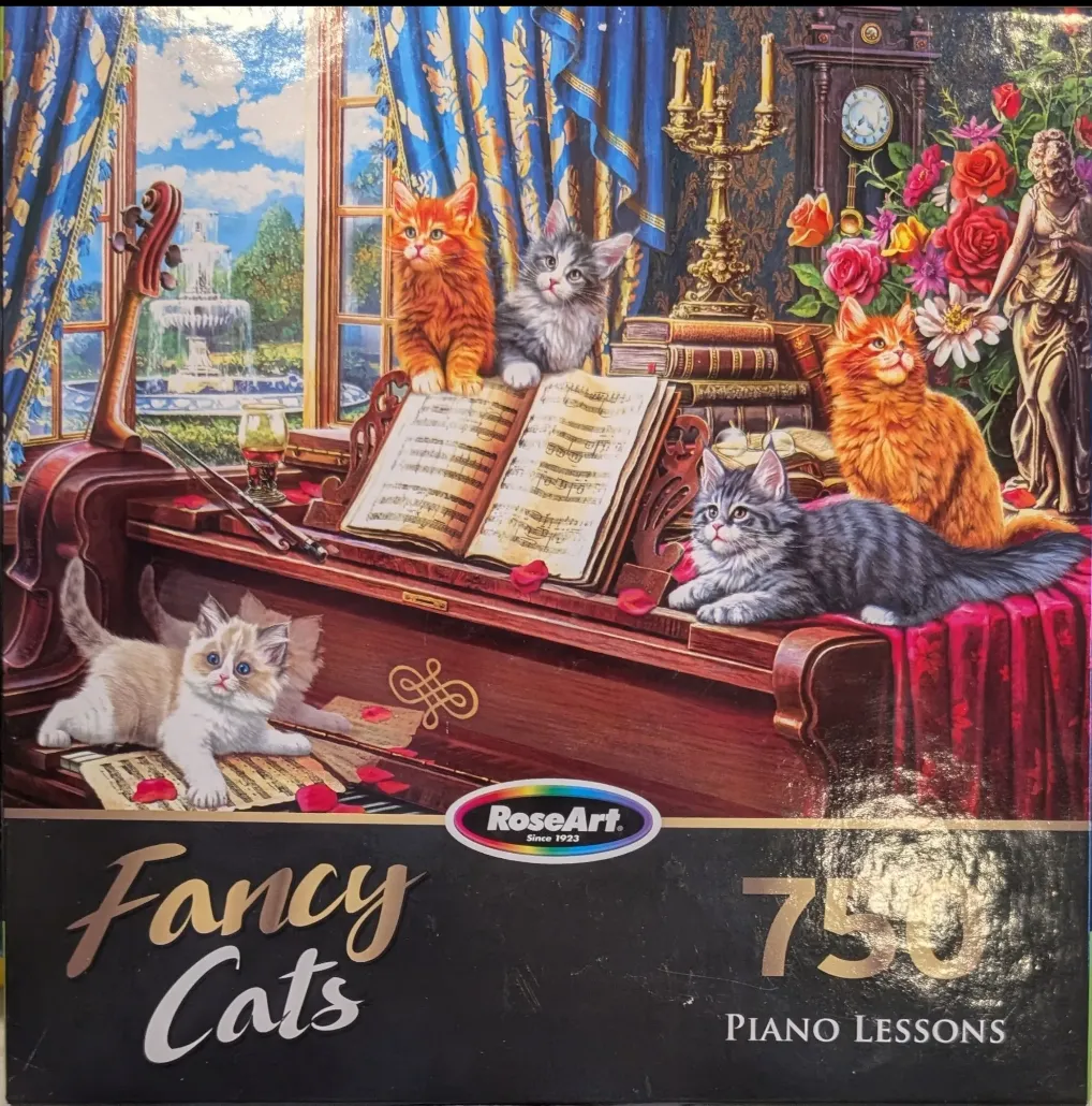 Four kittens playing on a grand piano in a formal room with a garden view.