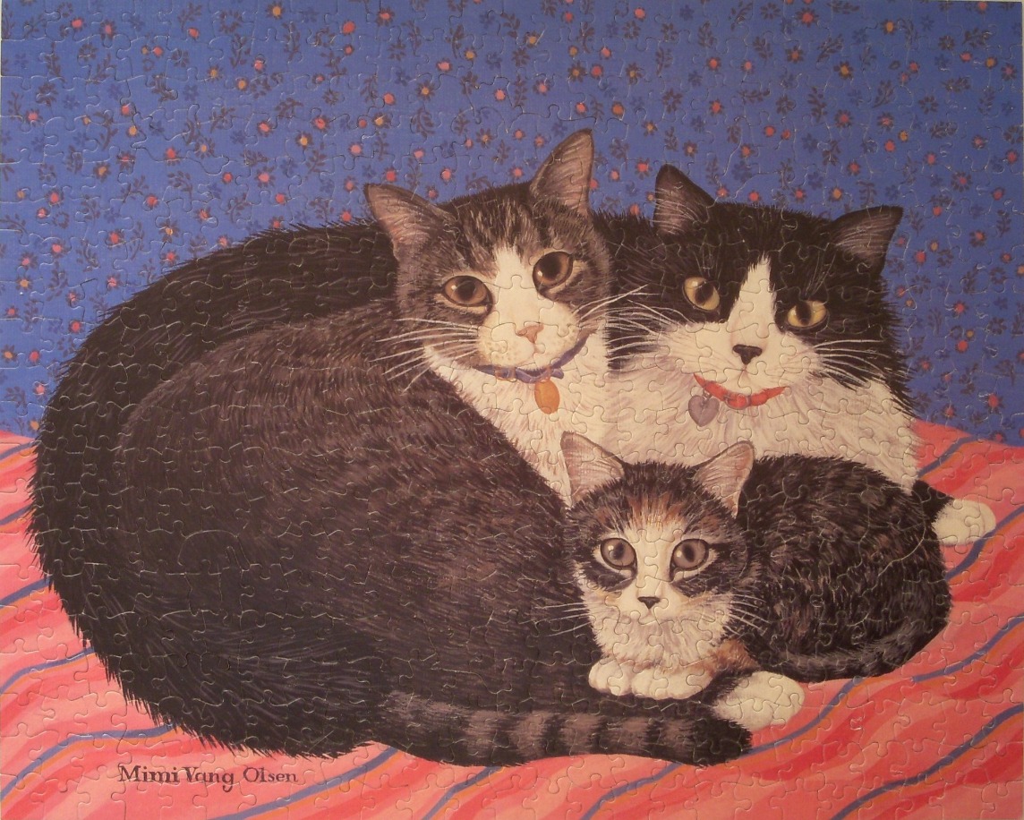 A painting of three cats, two adults and a kitten, resting together on a pink striped blanket.
