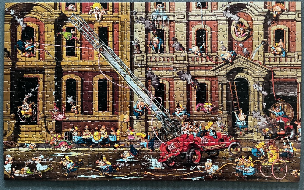 A chaotic cartoon scene of a fire brigade trying to put out a fire in a large building.