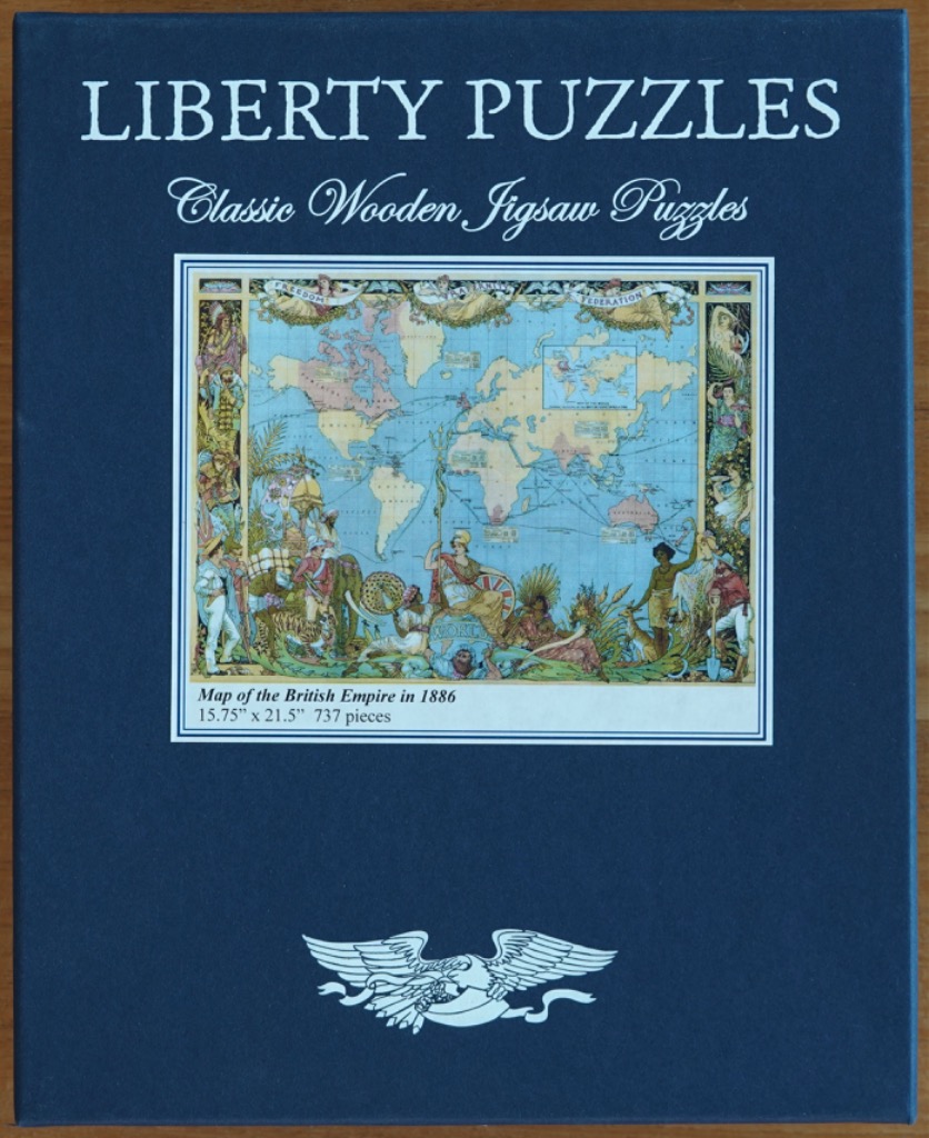 An illustration of an 1886 map of the British Empire, surrounded by ornate Victorian borders and allegorical figures.