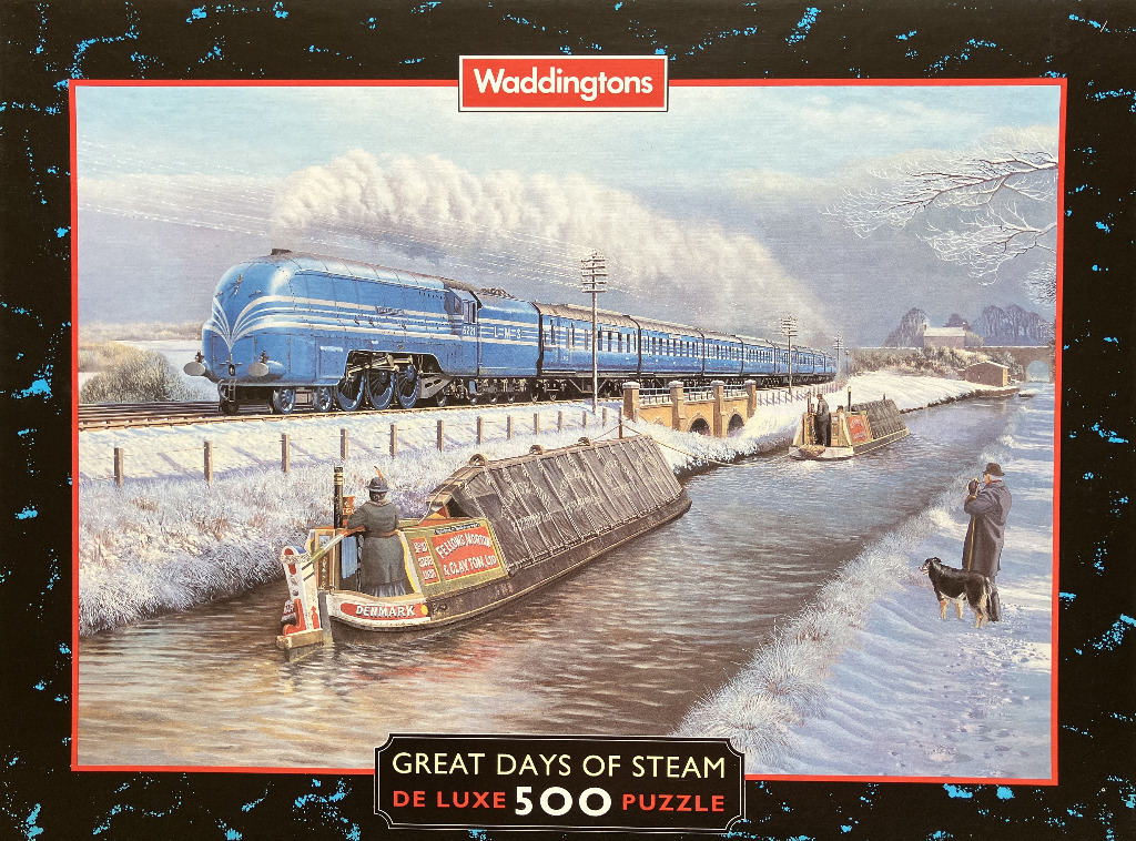 A blue steam locomotive traveling past a snowy canal with narrowboats and figures.