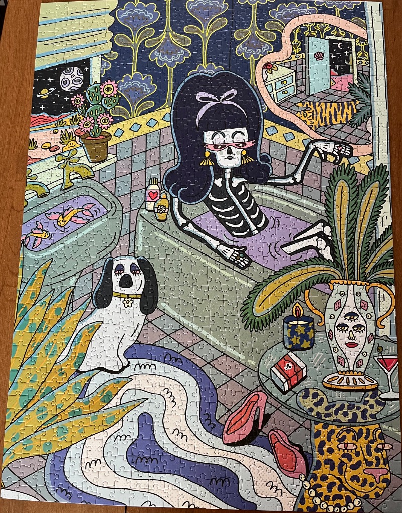 An illustration of a skeleton woman with a beehive hairdo relaxing in a bathtub in a whimsical, surreal bathroom.