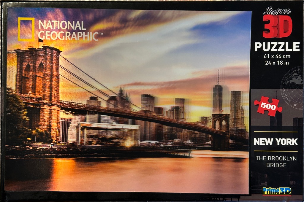A panoramic 3D-style photograph of the Brooklyn Bridge and the New York City skyline at sunset.
