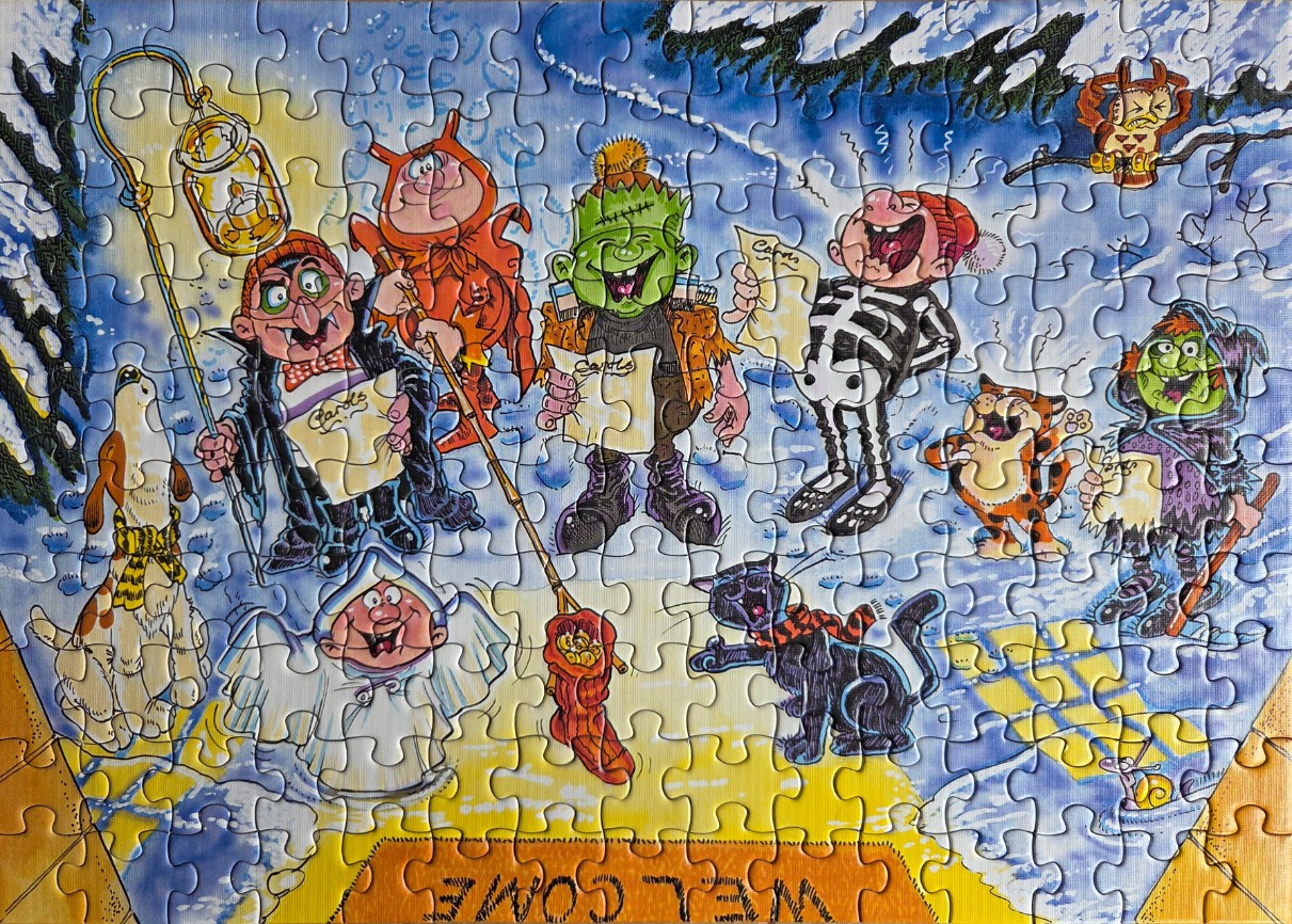 Halloween characters like Frankenstein, Dracula, and a skeleton sing carols in a snowy scene.