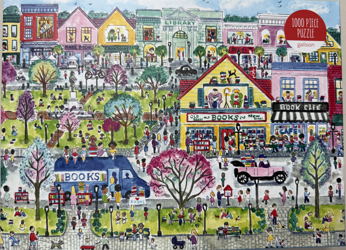 A whimsical watercolor illustration of a vibrant town square bustling with people reading books near a library and cafe.