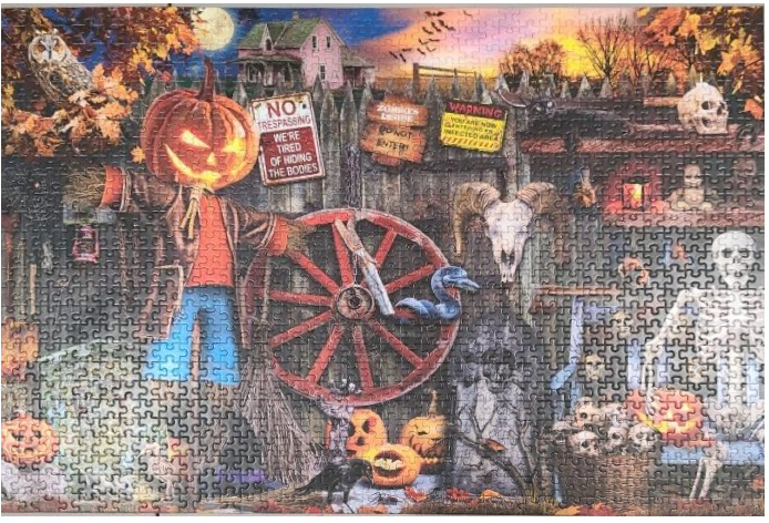 A spooky Halloween scene featuring a pumpkin-headed scarecrow, a skeleton, and warning signs in a dark, rural yard.
