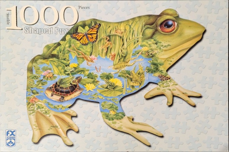 Illustration of a large green frog with a pond ecosystem visible inside its silhouette.
