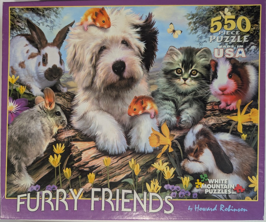 A group of small animals including a puppy, kittens, rabbits, and hamsters in a forest setting.