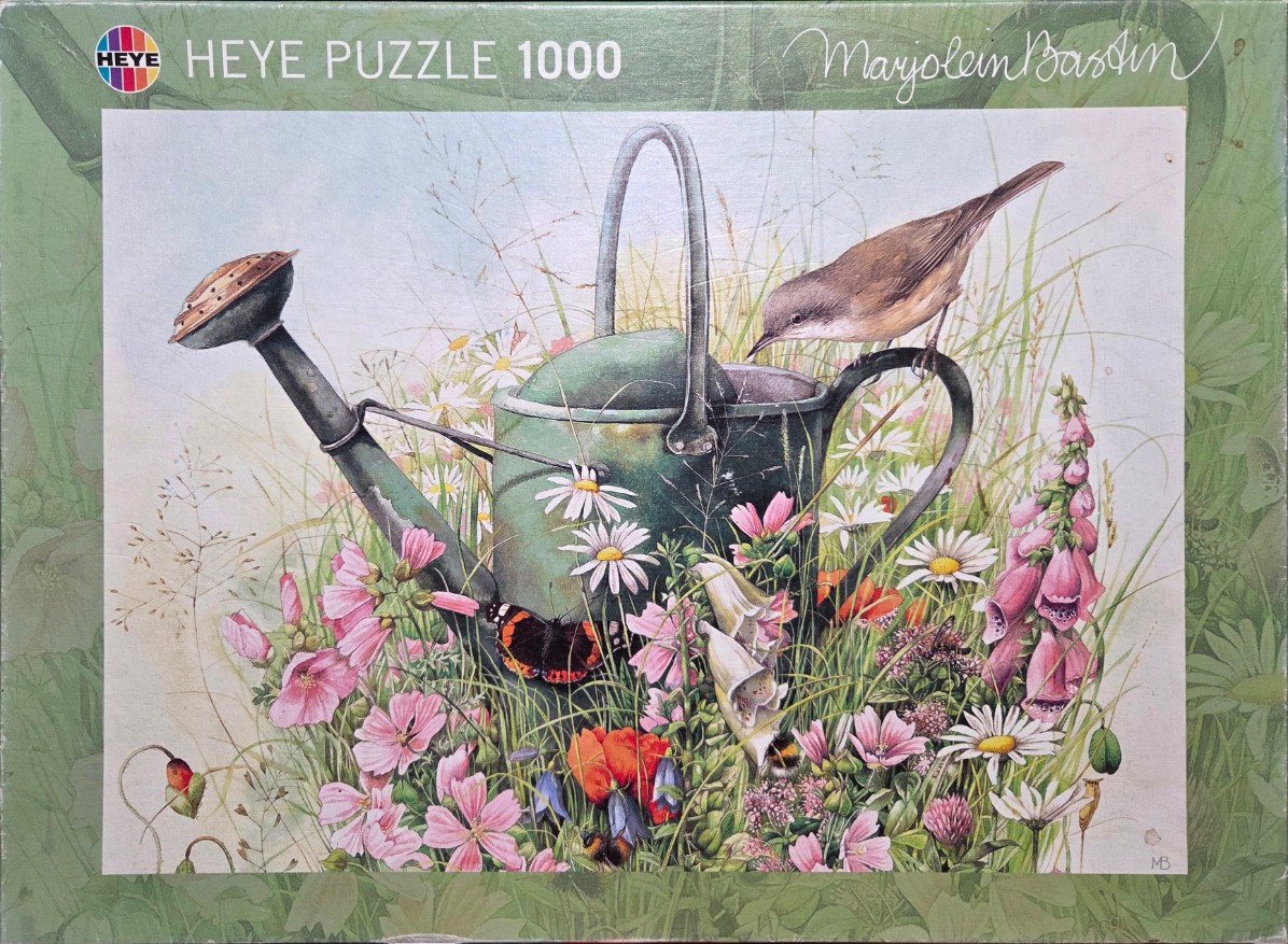 An illustration of a green metal watering can surrounded by garden flowers, a small bird, and a butterfly.