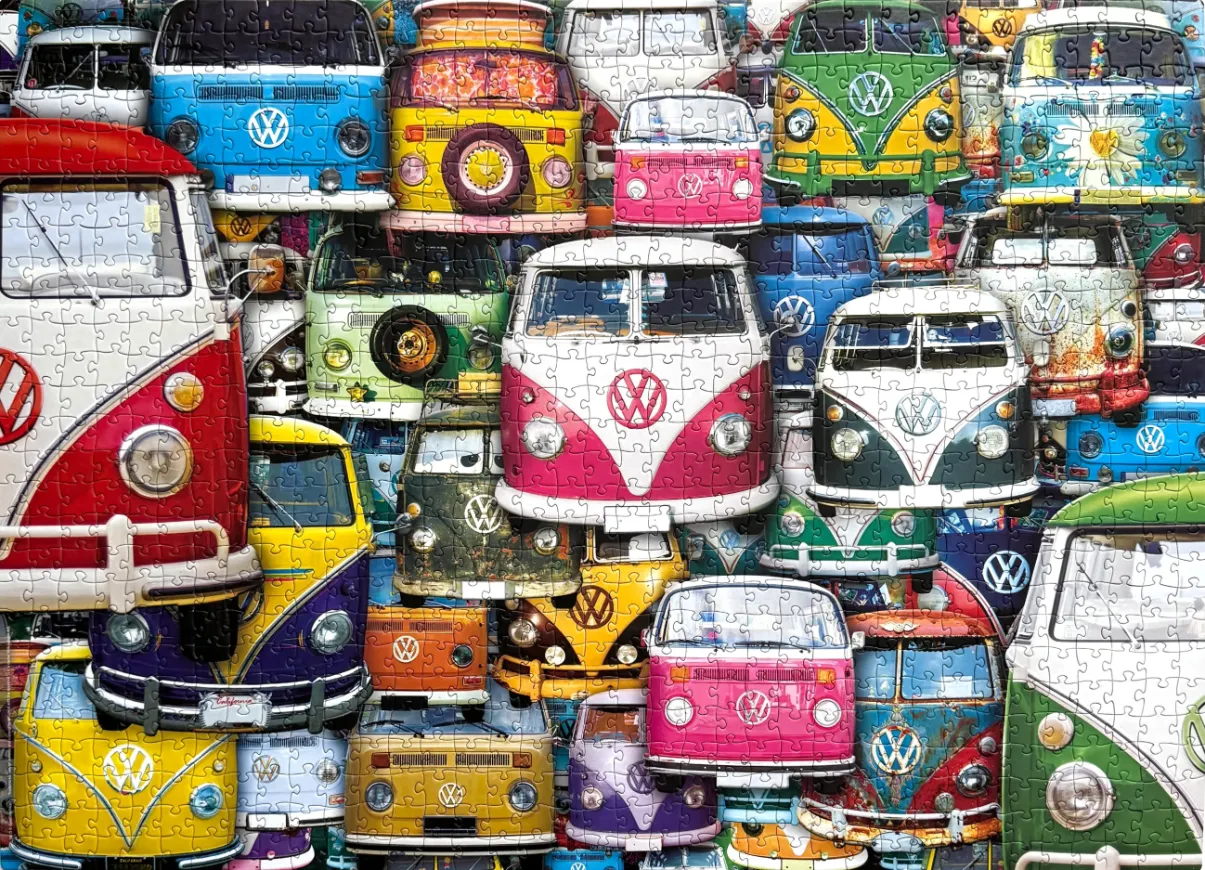A collage of many colorful vintage VW buses stacked together.