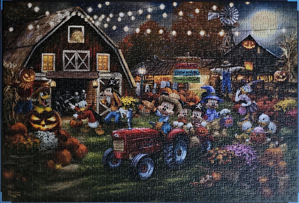 Disney characters in Halloween costumes at a farm festival