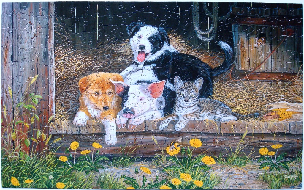 A puppy, piglet, and kitten sitting together in a barn doorway surrounded by dandelions.