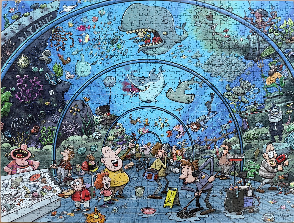 Cartoon illustration of a chaotic aquarium tunnel with sharks, a whale, and quirky tourists and staff.