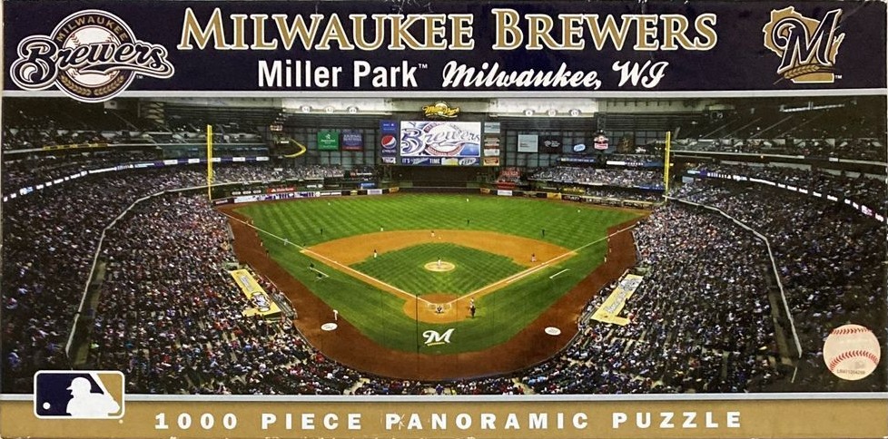 Panoramic interior view of Miller Park baseball stadium in Milwaukee, Wisconsin filled with spectators.