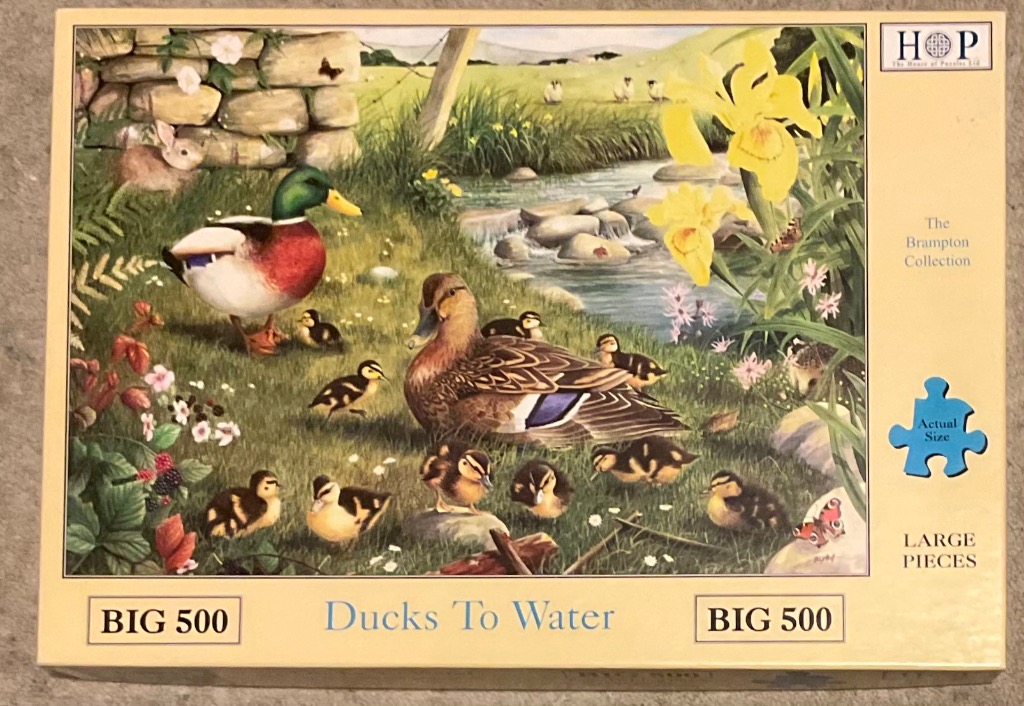Painting of a mallard duck family with ducklings by a gentle stream near a stone wall.