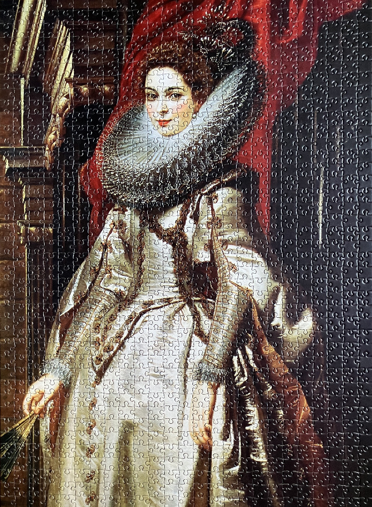 An oil portrait of a noblewoman from the Renaissance era featuring a prominent ruff collar and an elaborate white gown.