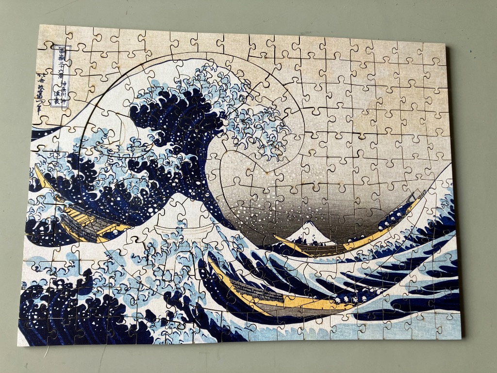 A print of Hokusai's The Great Wave off Kanagawa.