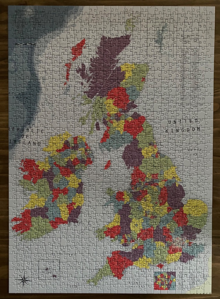 Political map of the British Isles and Ireland with a vintage muted color palette.