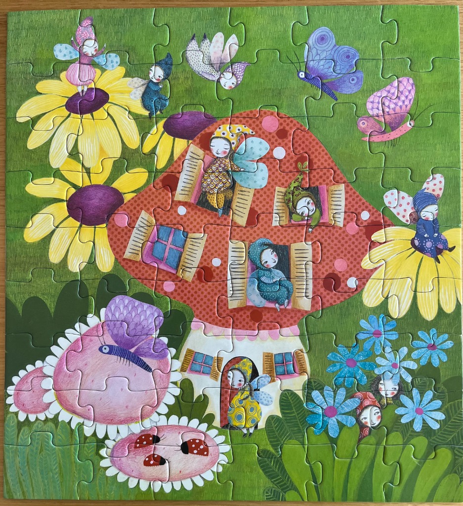 Illustration of whimsical fairies living in a large mushroom house surrounded by flowers and butterflies.
