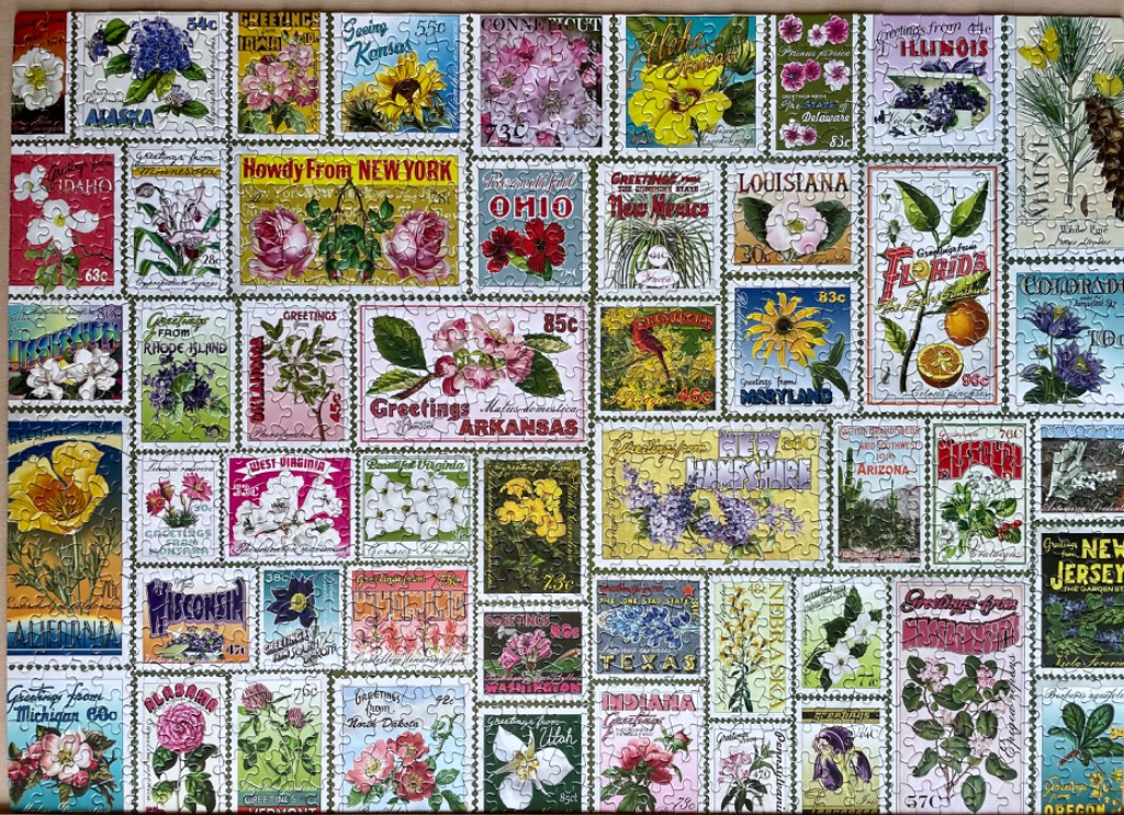 A collage of vintage-style postage stamps featuring flowers and state names from the United States.