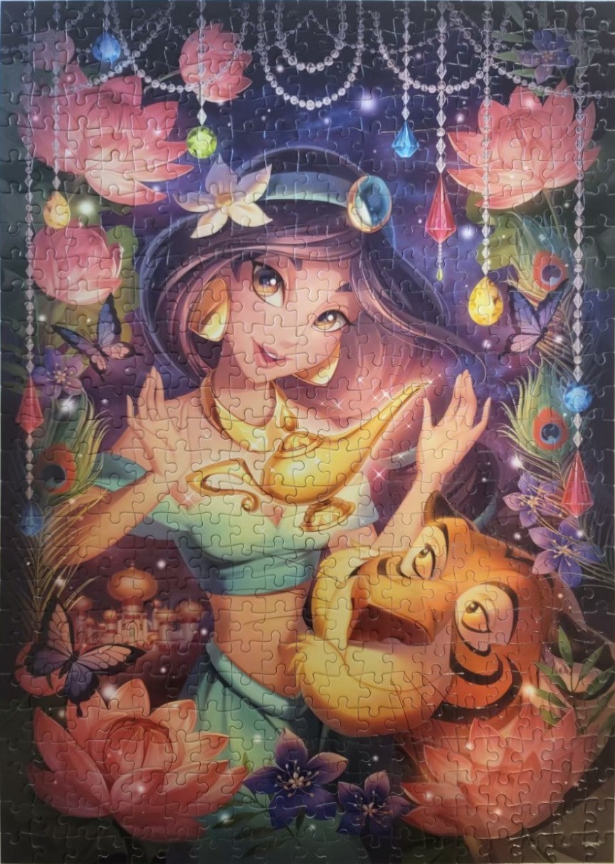 An illustration of Princess Jasmine and her tiger Rajah surrounded by flowers, crystals, and butterflies.
