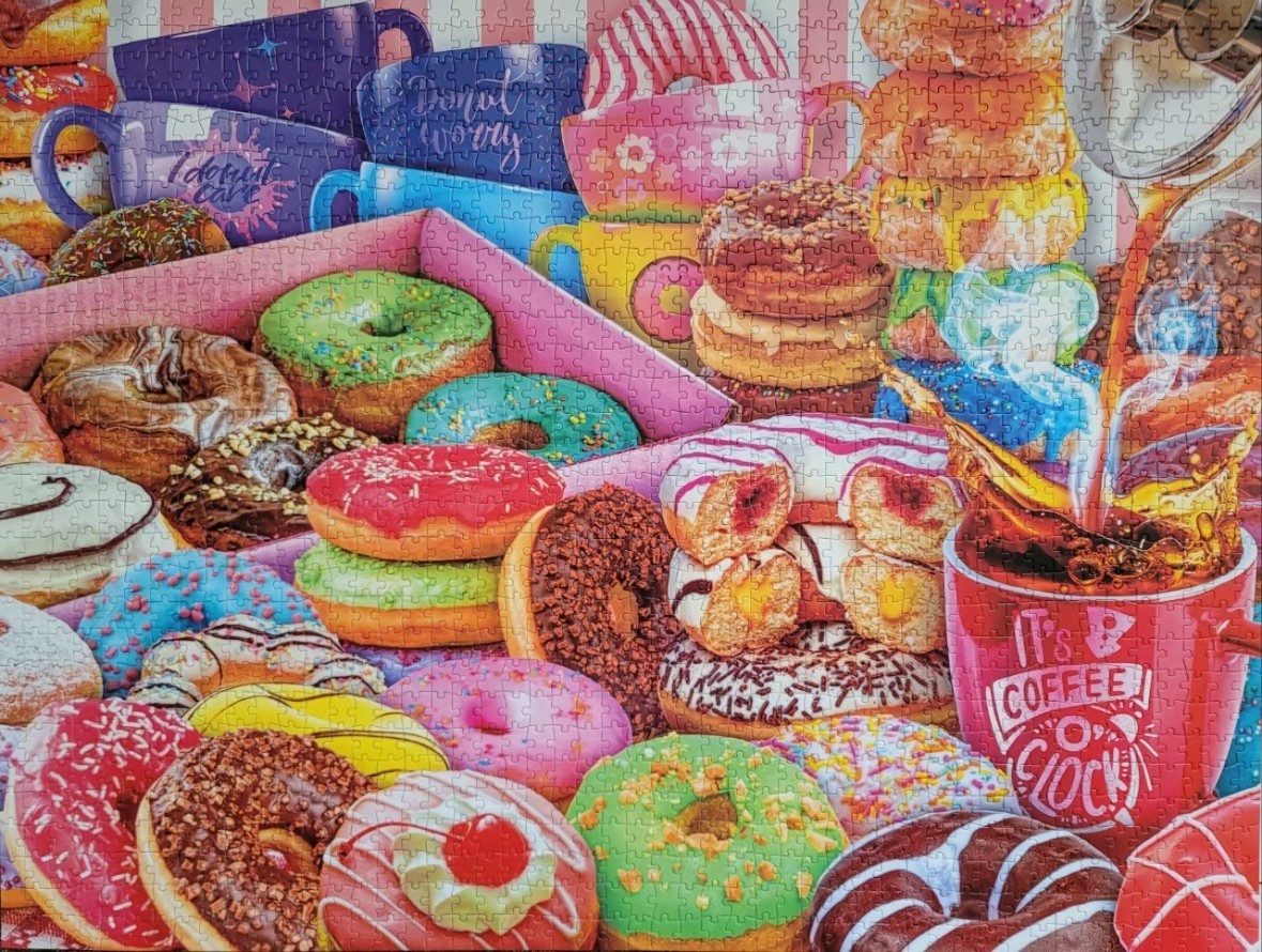 A whimsical illustration of a table filled with various colorful donuts, stacked mugs, and coffee being poured.