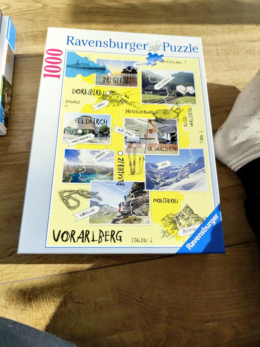 A collage map of the Vorarlberg region in Austria featuring various photographic scenes from the area.