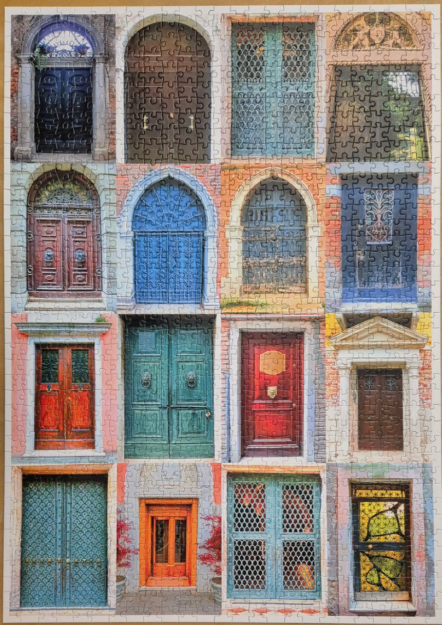 A collage of sixteen ornate, colourful doors from diverse European architecture.