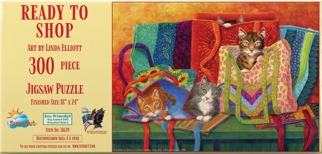 Painting of three cats sitting inside colorful patterned tote bags