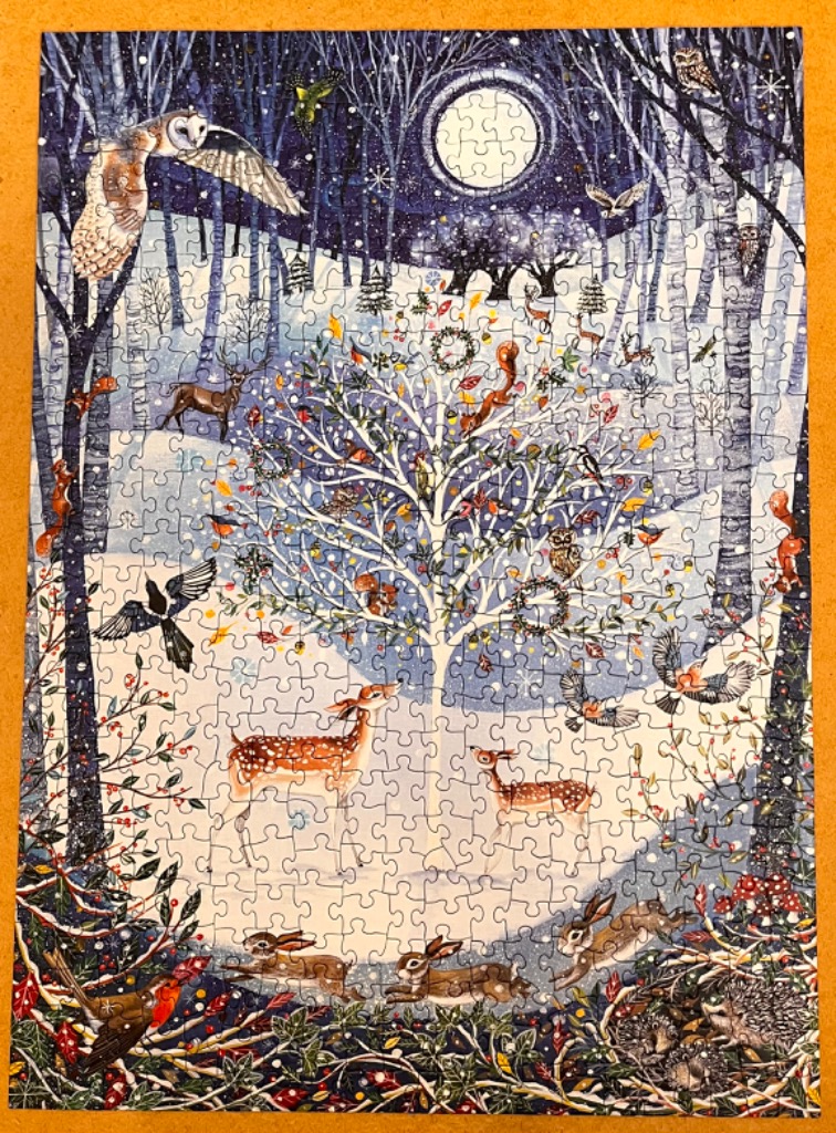 A whimsical winter forest scene filled with diverse wildlife, a central white tree, and a glowing full moon.