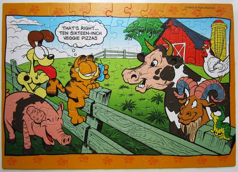 Garfield ordering pizza on a farm with various farm animals.