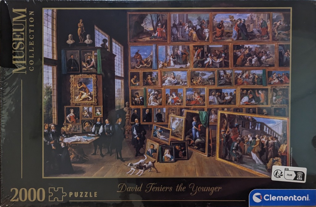 A gallery interior featuring dozens of oil paintings hung on walls and leaning against the floor, with figures observing.