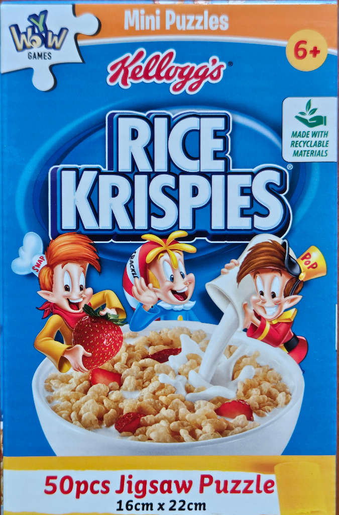The three classic Rice Krispies cartoon elves, Snap, Crackle, and Pop, preparing a bowl of cereal with strawberries.
