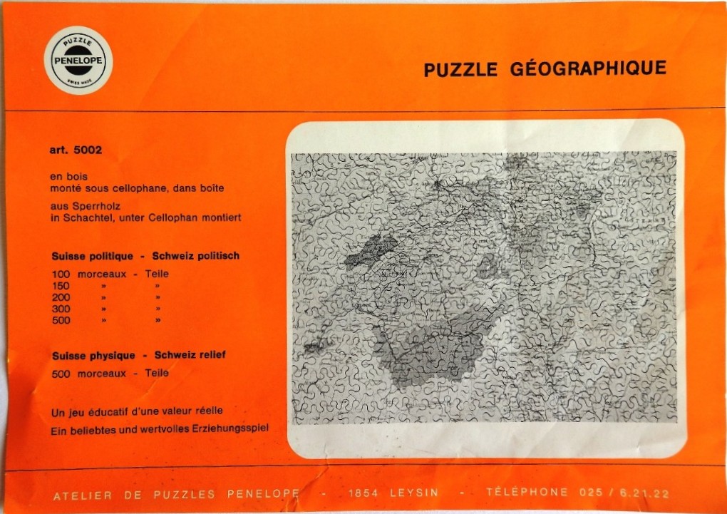 An orange rectangular informational sheet featuring a grayscale map of Switzerland cut into interlocking pieces.