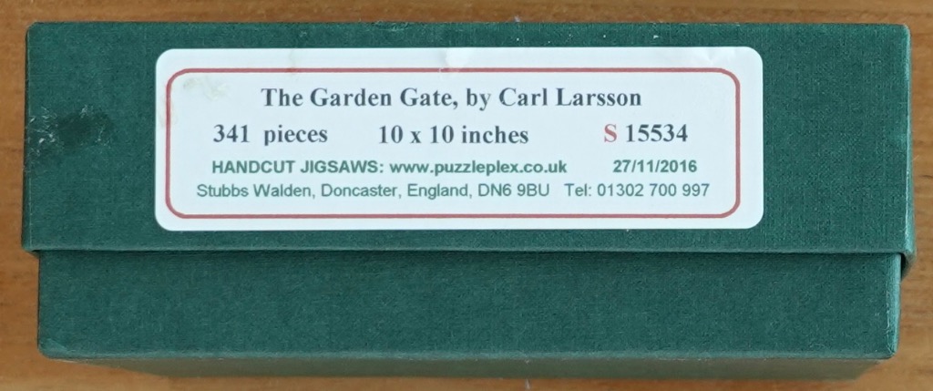 Text label for The Garden Gate by Carl Larsson on a green background.