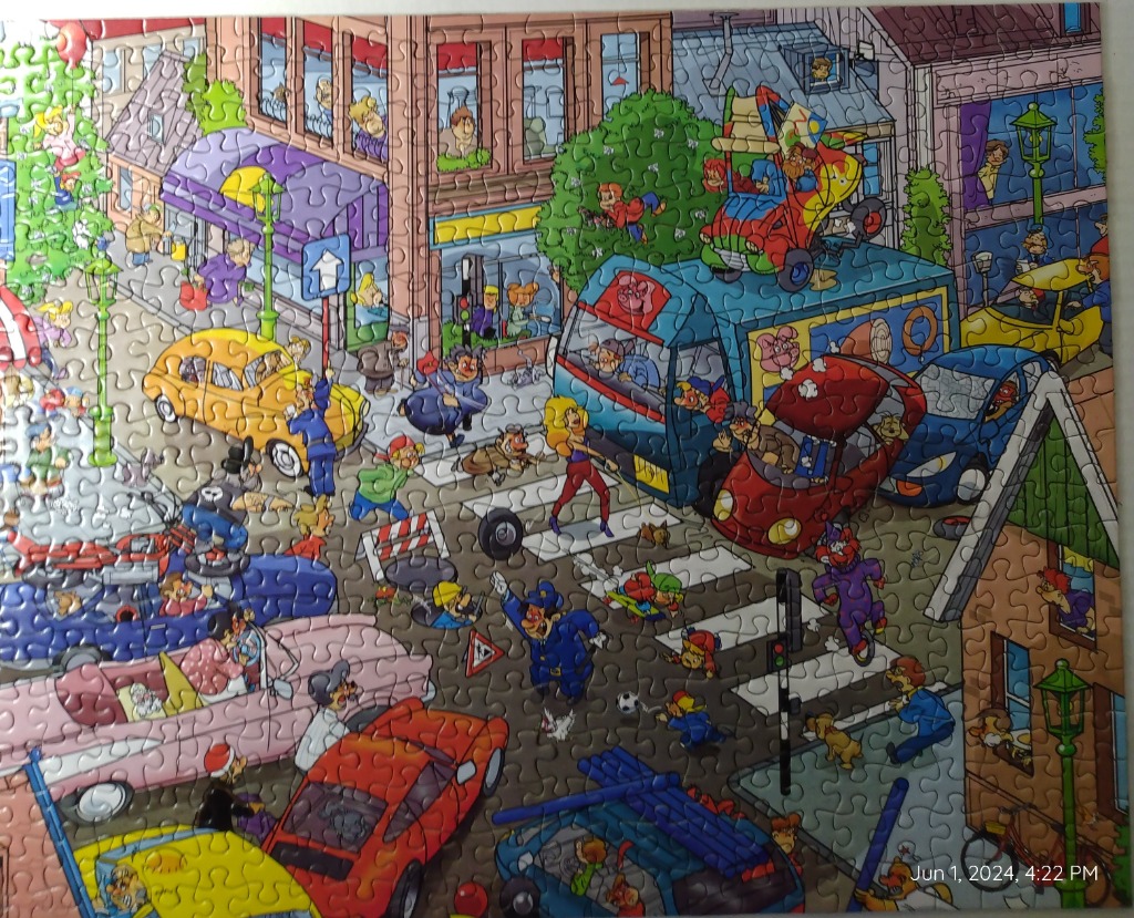 A chaotic, colorful illustration of a busy city street scene filled with people, cars, and humorous activity.