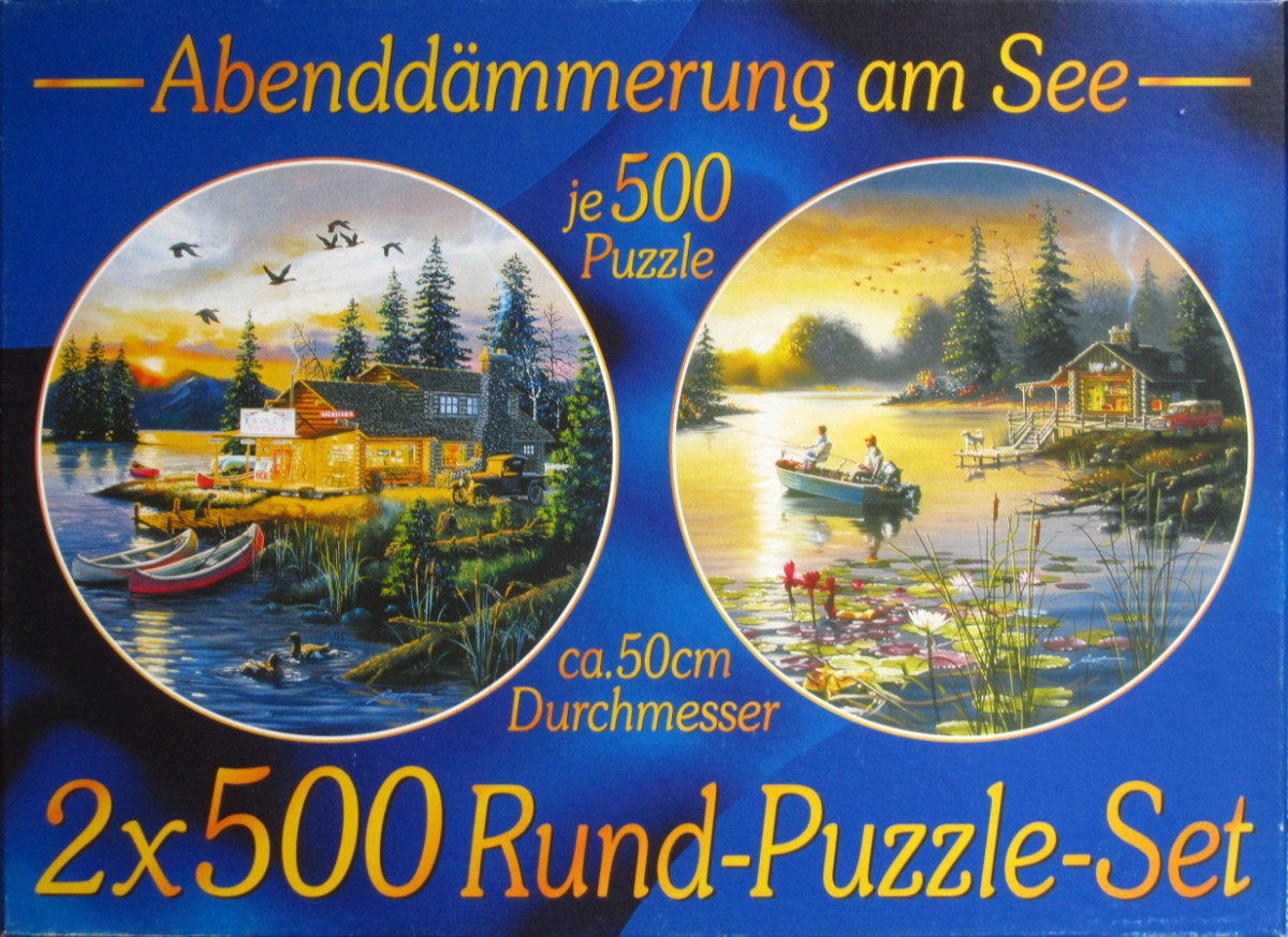 Two circular landscape paintings depicting lakeside cabins at sunset