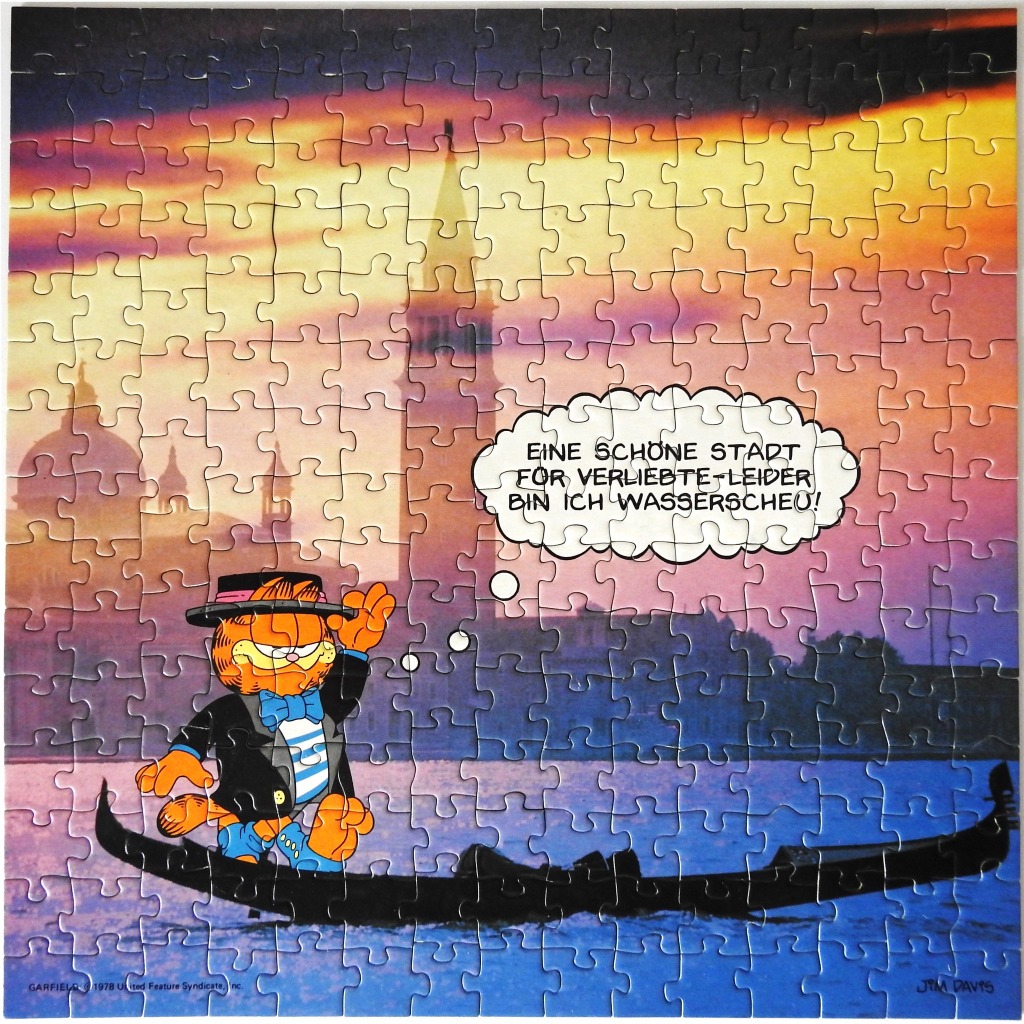 Garfield the cat wearing a tuxedo and top hat standing in a gondola in Venice at sunset.