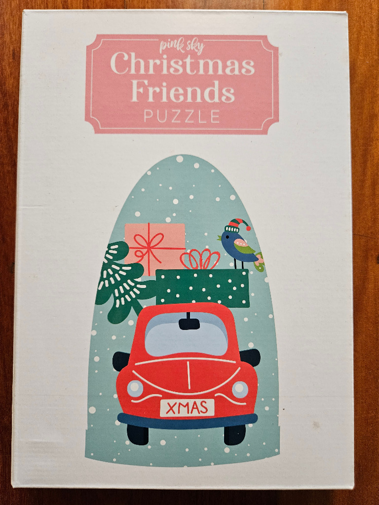 A cartoon illustration of a red car carrying a Christmas tree and gifts inside a snow globe.