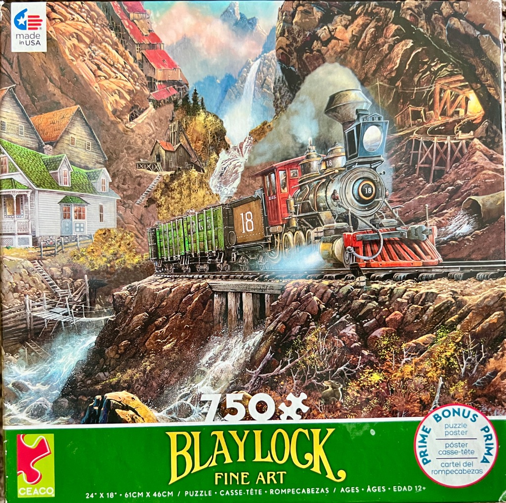 Vintage steam locomotive traveling on tracks through a rugged mountain mining town with a waterfall in the background.