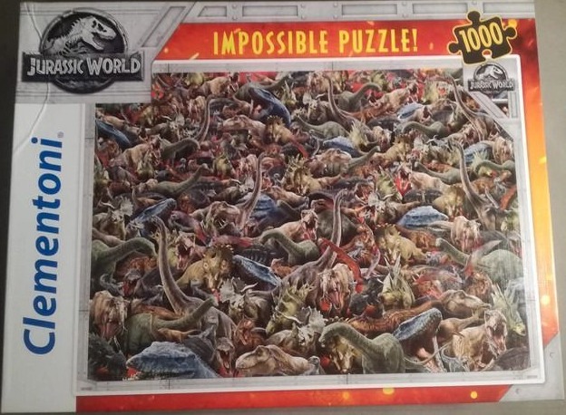 A chaotic, dense collage of many different dinosaurs packed tightly together.